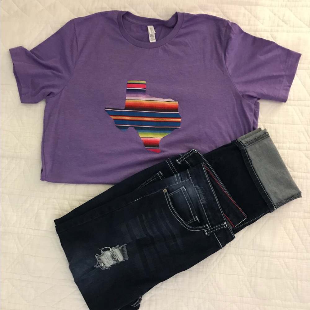 Purple t shirt with a serape Texas.